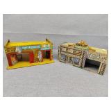 Two vintage tin play buildings