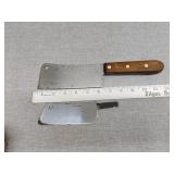 Two cleavers one is missing handle