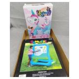 Inflatable easel and unicorn rocket