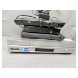 3 DVD players one VHS player no remotes