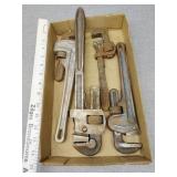 Pipe wrenches blue one is rigid