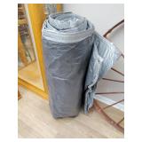 Heavy duty tarp is large but unknown size