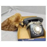 Antique phone and fur hat