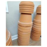 11 clay pots and five bases