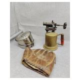 Vintage torch, catchers mitt and Coleman metal