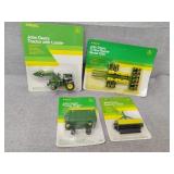 Four John Deere toys small