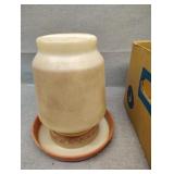 Four plastic chicken waters