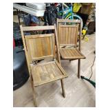 Two wood fold chairs