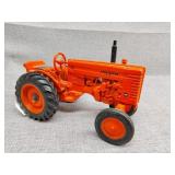 Orange John Deere display tractor