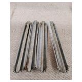 Four smaller chicken feeders