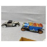 Two antique toy cars