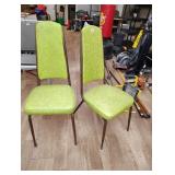 Two vintage green chairs