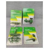 4  small John Deere toys