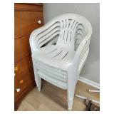 6 plastic white chairs