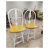 2 swivel wood chairs