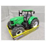 Electronic tractor does work lights and sound