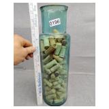 Glass full of wine corks