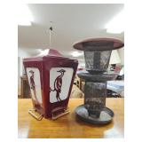 Two bird feeders