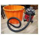 Small vacuum and large plastic tub