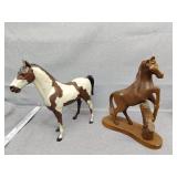 Two horses run plastic one wood