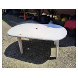 Plastic patio table some damage 27x 60x 36