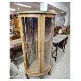 Corner curio cabinet with three glass shelves