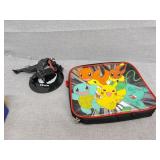 Pokï¿½mon bag and venom figure