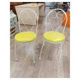 Two metal frame chairs