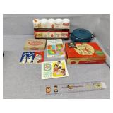 Tobacco display empty, green stamp book and more