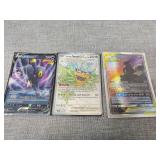 Three holographic pokï¿½mon cards