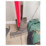 Two steel rakes and shovel