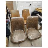 Four rolling chairs two pairs