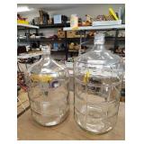 Two glass carboys