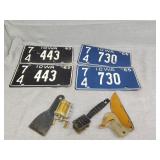 Antique fishing reel and Iowa license plates