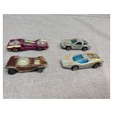 Four red line Hot Wheels cars