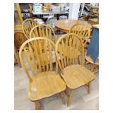 Five wood kitchen chairs