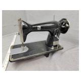 Round bobbin sewing machine