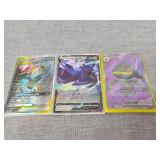 Three holographic pokï¿½mon cards