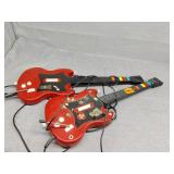 Two gaming guitars