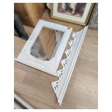 White mirror and hanger shelf