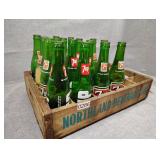 7-Up bottles and wood crate
