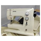 Bernina sewing machine with carrier