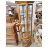 Glass front  cabinet three shelves 70.5 x 24x 12