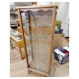 Glass front cabinet four shelves 55.5 x21x 12.5