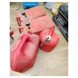 2 plastic red gas cans & 2 plastic gas tanks no