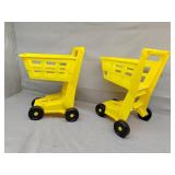 Two plastic Dollar general kid carts