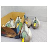 Five duck floating decoys