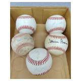 Five signed  baseballs
