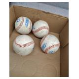 Four baseballs