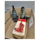 Three hydraulic jacks